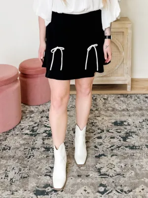2 Bow Pleated Mini Skirt in Black
