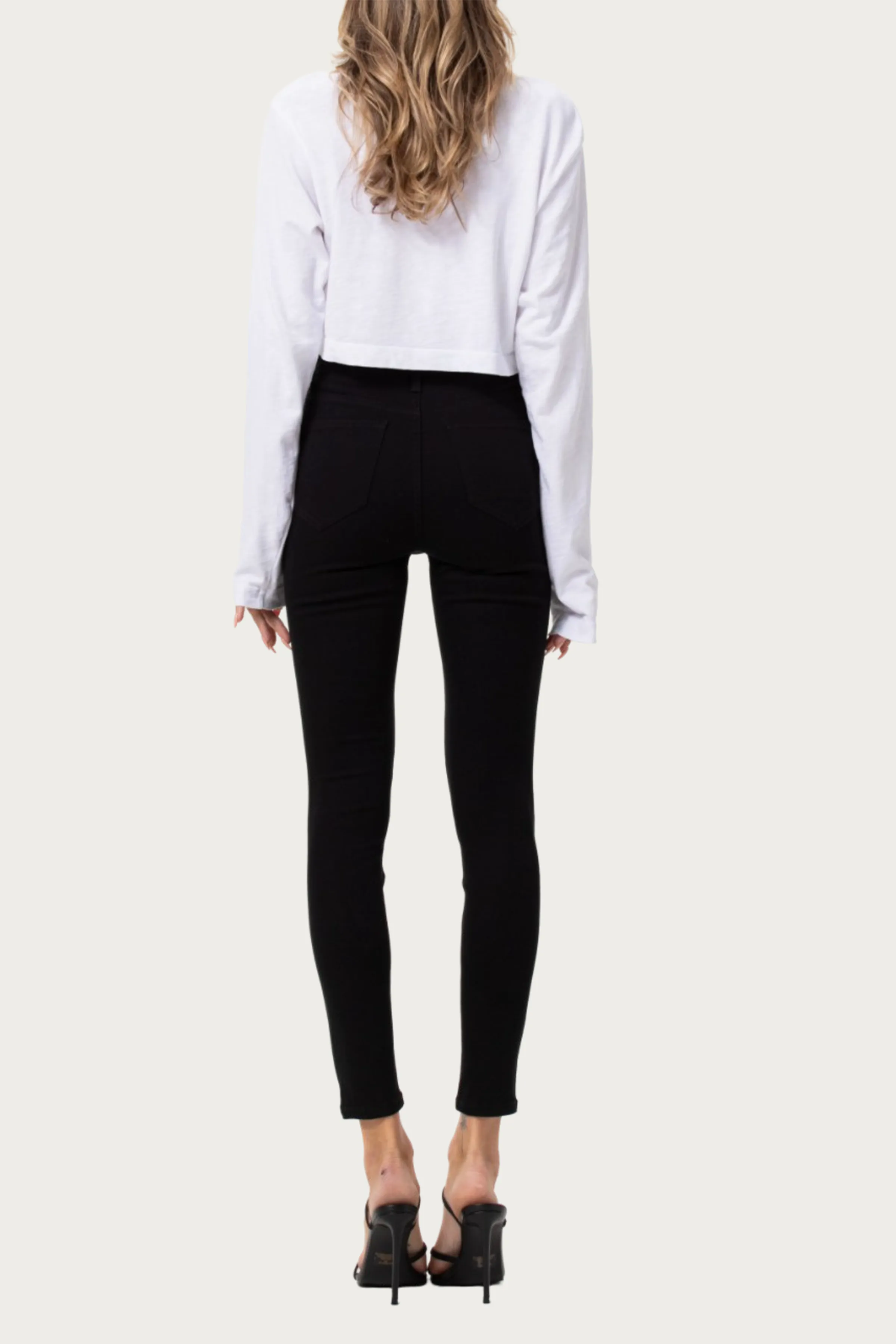 HIGH-RISE DISTRESSED SKINNY JEANS