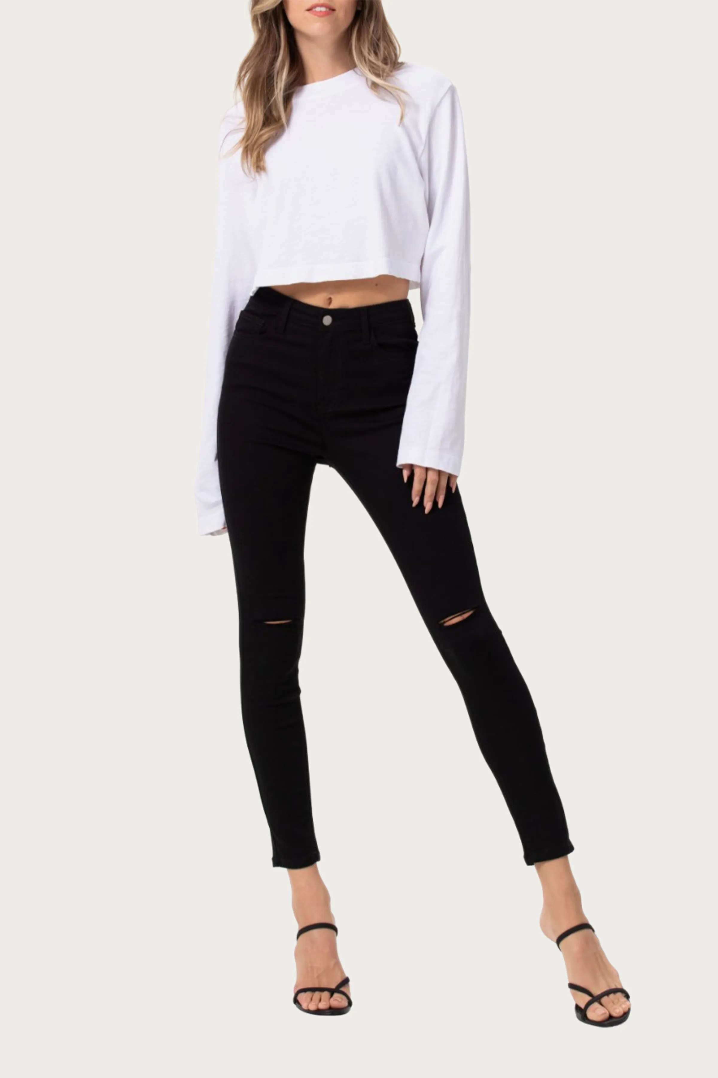 HIGH-RISE DISTRESSED SKINNY JEANS