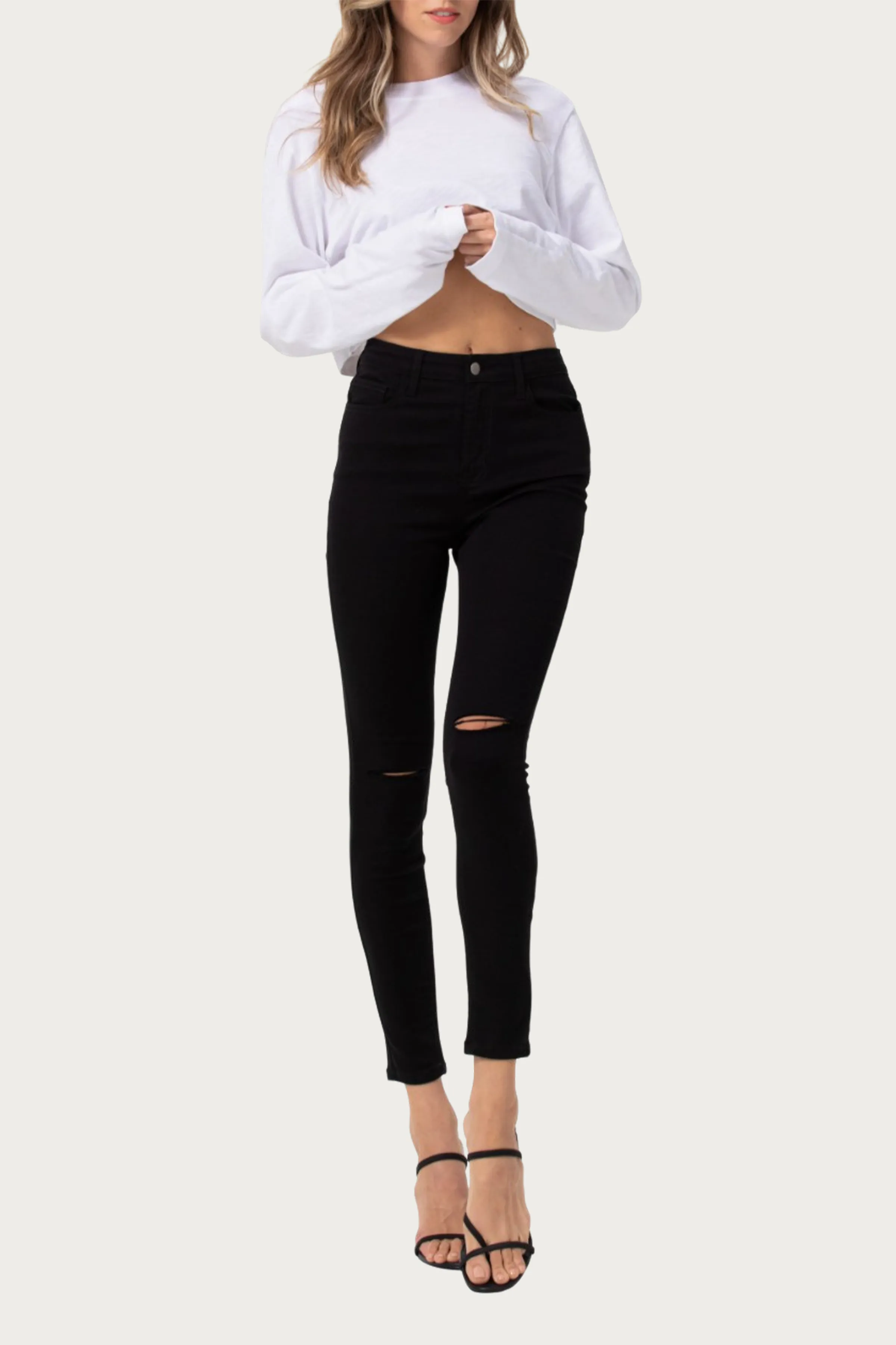 HIGH-RISE DISTRESSED SKINNY JEANS