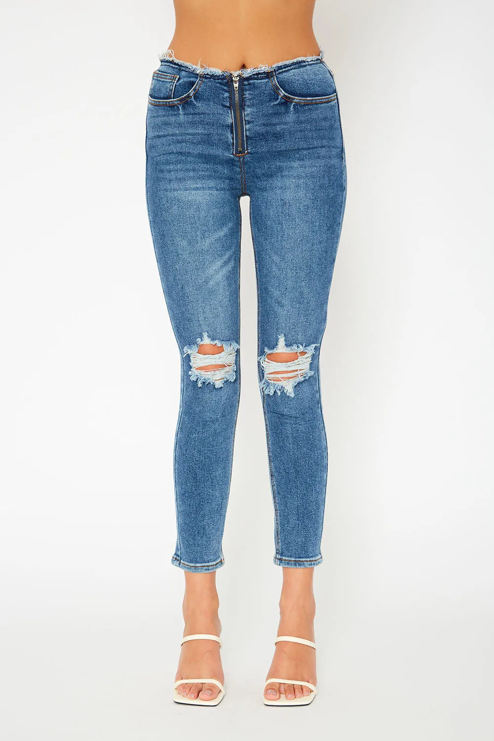 Mid-rise medium blue skinny jeans