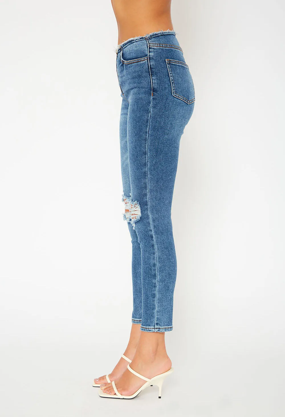 Mid-rise medium blue skinny jeans