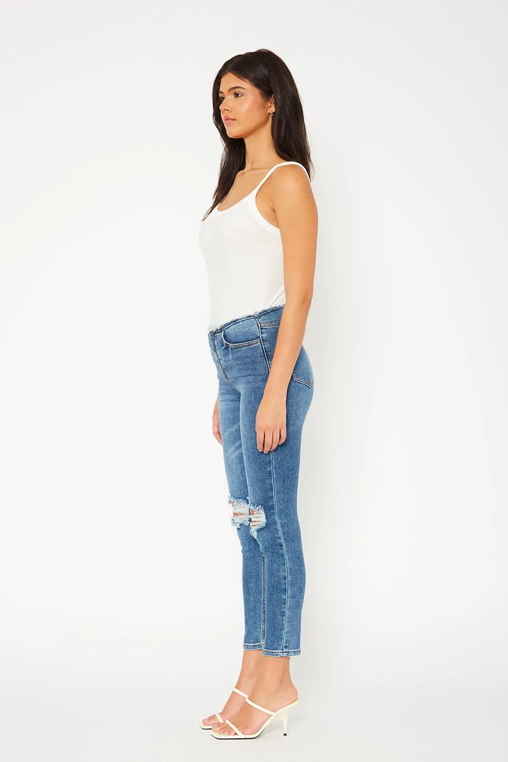 Mid-rise medium blue skinny jeans