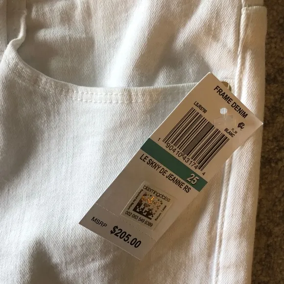 NWT $205 Frame Skinny de Jeanne Step Hem Jeans Blanc Size 25 Revolve