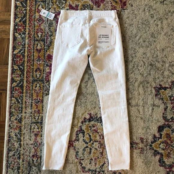 NWT $205 Frame Skinny de Jeanne Step Hem Jeans Blanc Size 25 Revolve