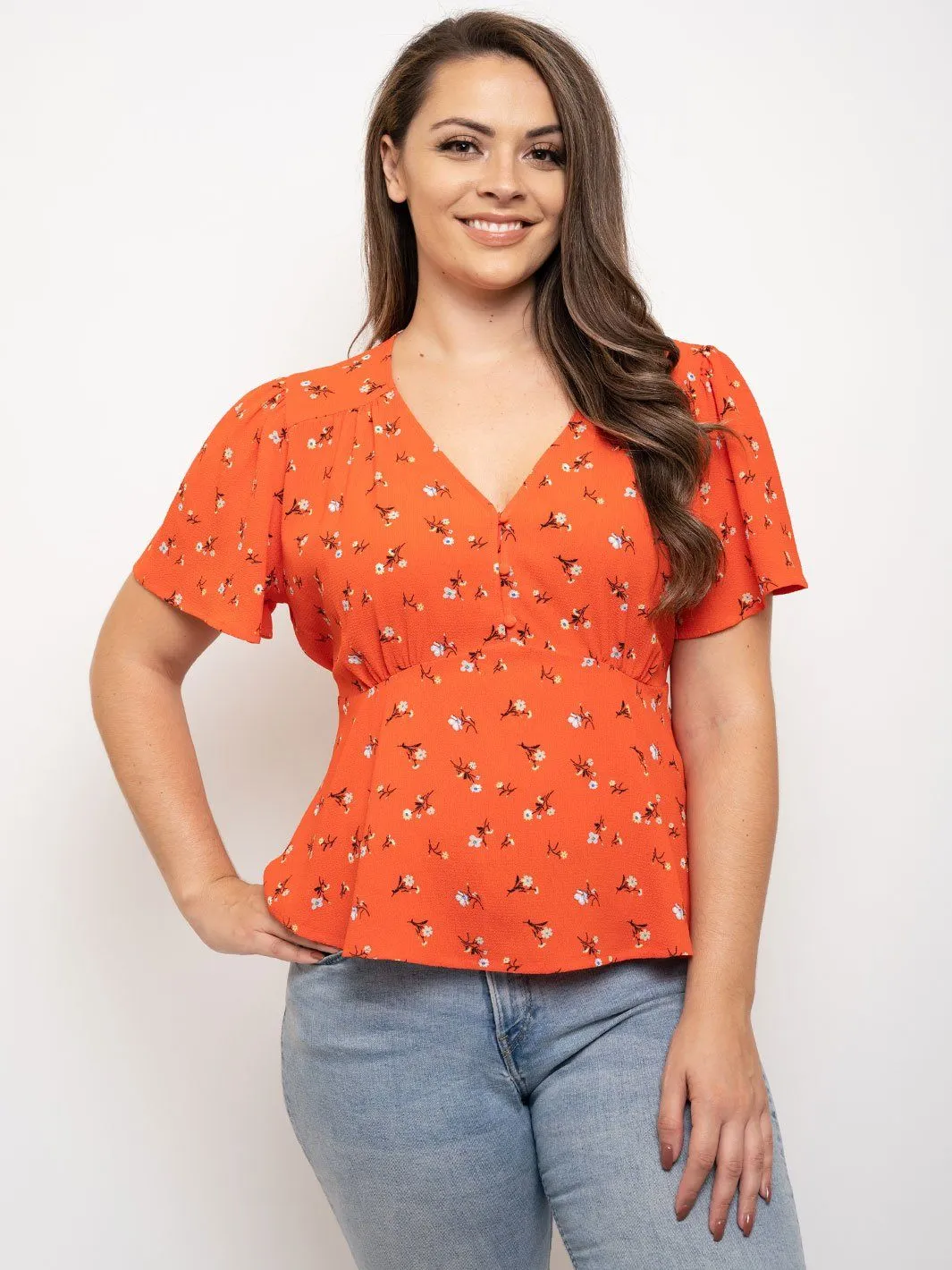 PLUS SIZE FLORAL BUTTON DETAIL PEPLUM TOP
