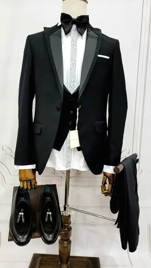 Single Button Three Pieces Tuxedo Suit with Black satin Lapel, matching bow tie and black dress pants.