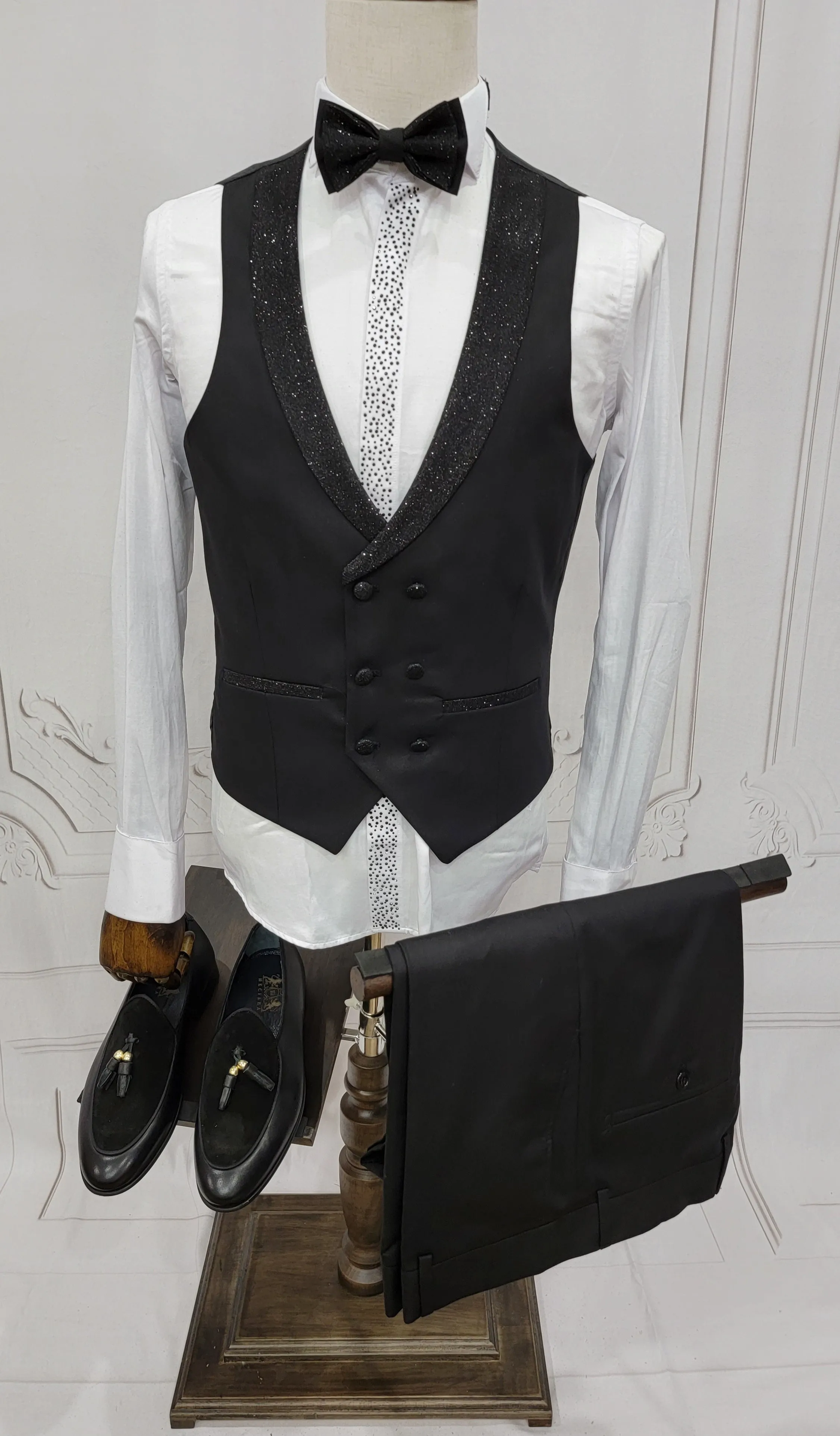 Three Pieces Tuxedo Suit with Contrasting shiny silver accent handmade sparkles, matching bow tie and Black Pants.