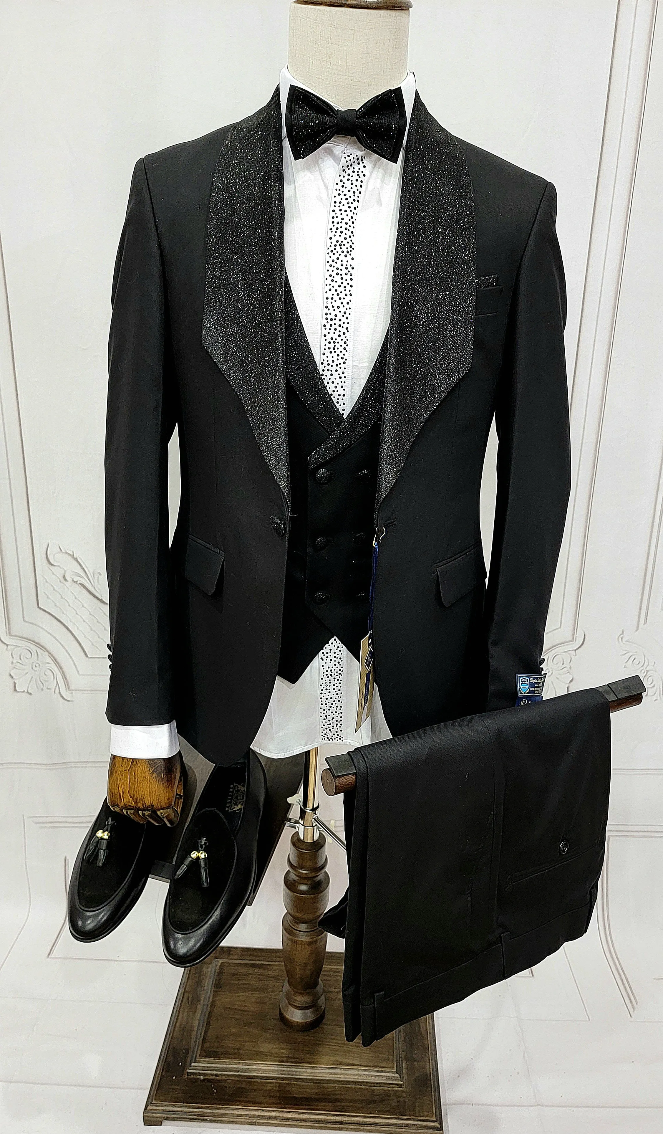 Three Pieces Tuxedo Suit with Contrasting shiny silver accent handmade sparkles, matching bow tie and Black Pants.