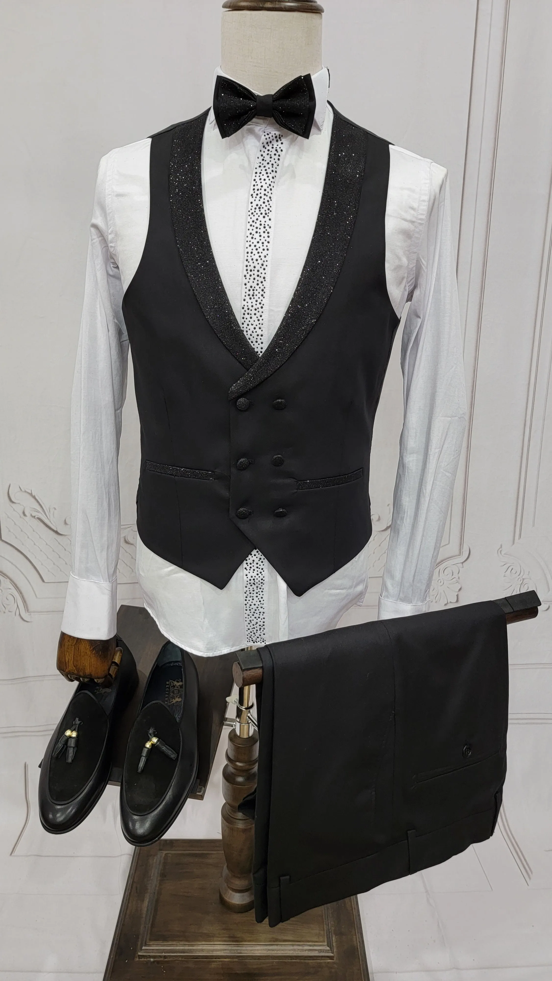 Three Pieces Tuxedo Suit with Contrasting shiny silver accent handmade sparkles, matching bow tie and Black Pants.