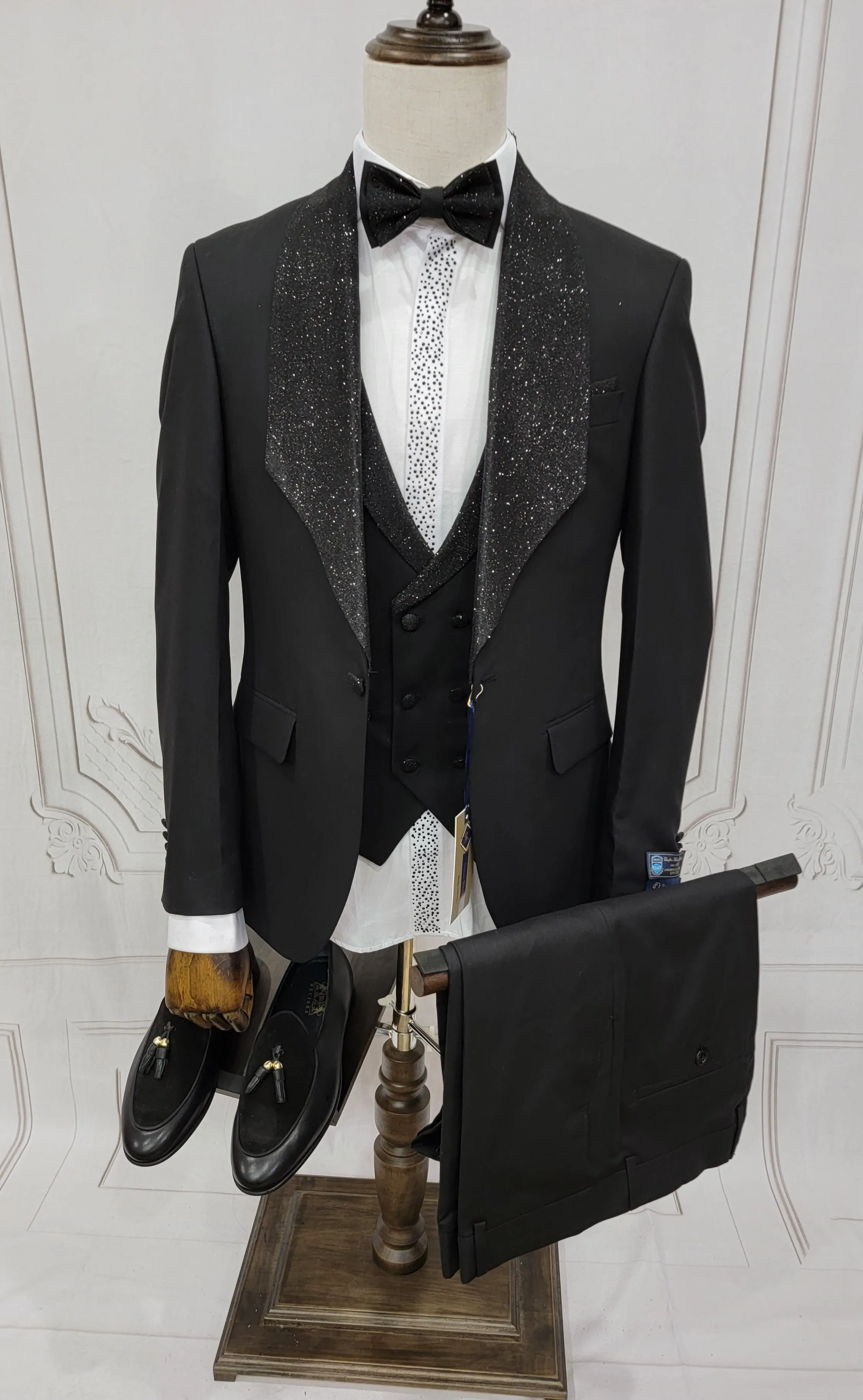 Three Pieces Tuxedo Suit with Contrasting shiny silver accent handmade sparkles, matching bow tie and Black Pants.